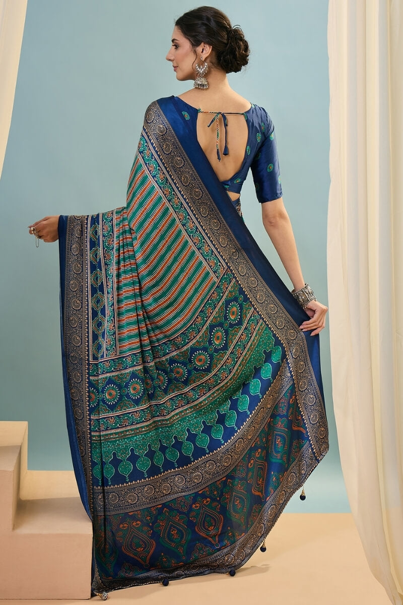 Sonorous Dark Green Ajrakh Printed Semi Modal Silk Saree With Breathtaking Blouse Piece