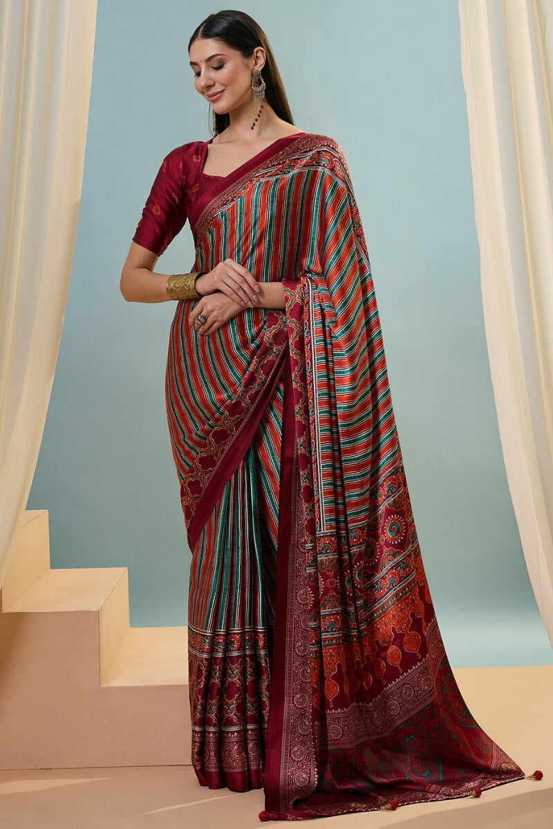 Enigmatic Red Ajrakh Printed Semi Modal Silk Saree With Blissful Blouse Piece