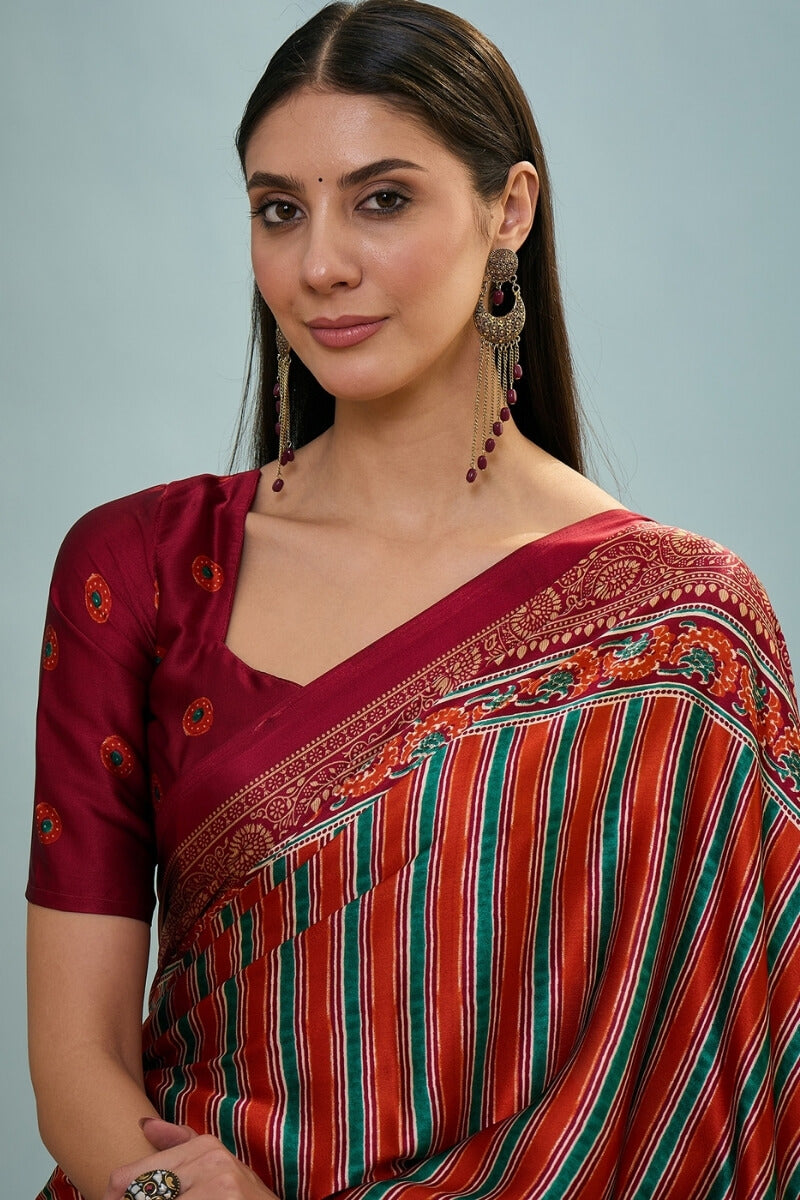 Enigmatic Red Ajrakh Printed Semi Modal Silk Saree With Blissful Blouse Piece