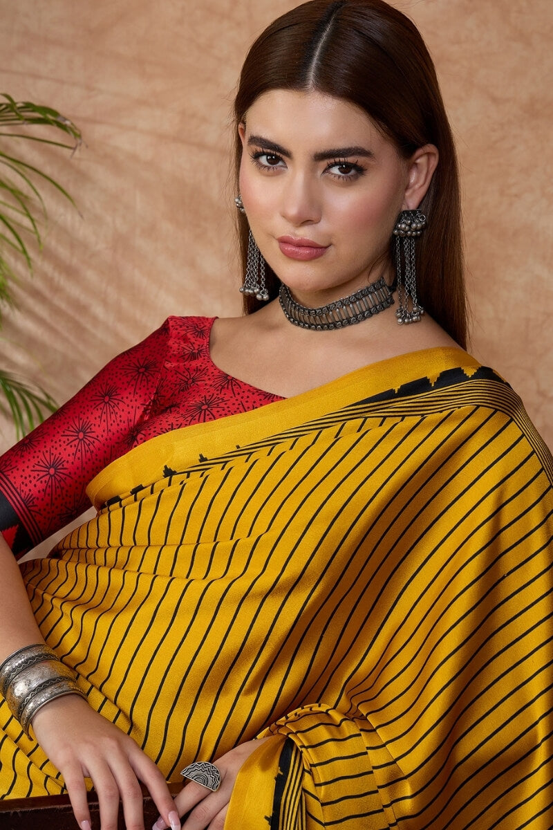Sensational Yellow Ajrakh Printed Semi Modal Silk Saree With Resonant Blouse Piece