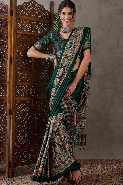 Most Stunning Dark Green Ajrakh Printed Semi Modal Silk Saree With Opulent Blouse Piece