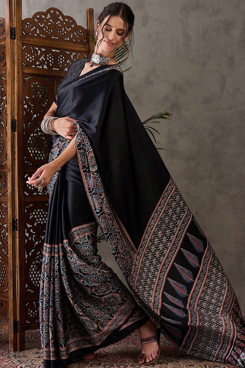 Prettiest Black Ajrakh Printed Semi Modal Silk Saree With Allure Blouse Piece