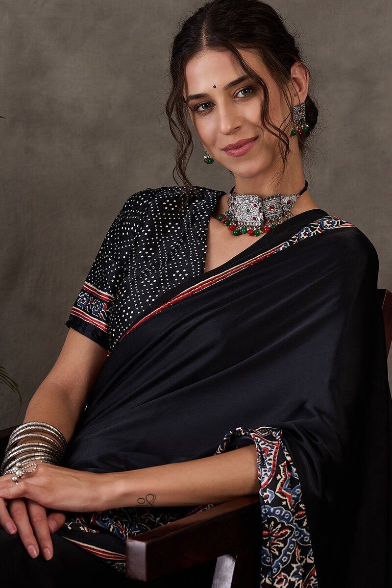Prettiest Black Ajrakh Printed Semi Modal Silk Saree With Allure Blouse Piece