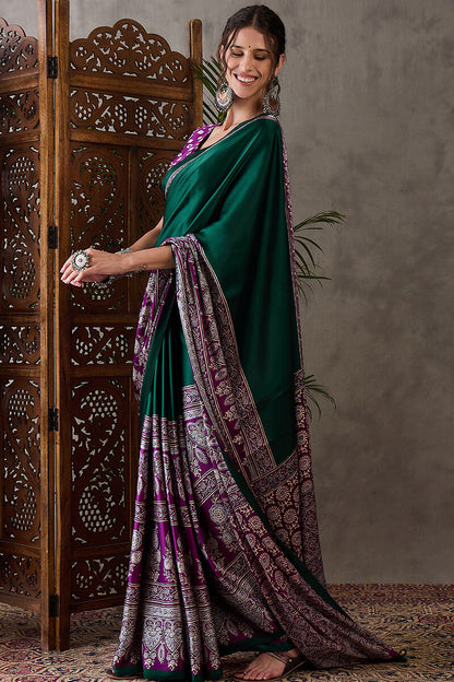 Sizzling Dark Green Ajrakh Printed Semi Modal Silk Saree With Glowing Blouse Piece