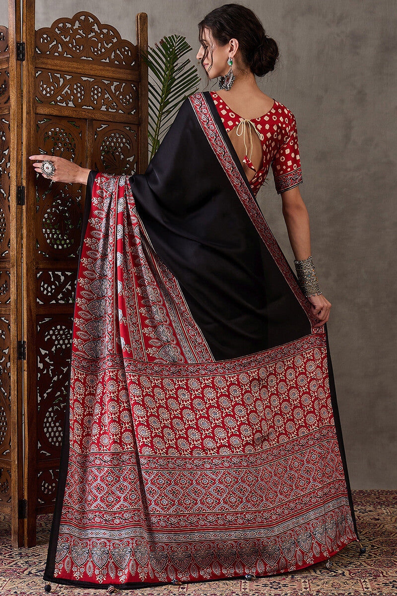 Ravishing Black Ajrakh Printed Semi Modal Silk Saree With Excellent Blouse Piece