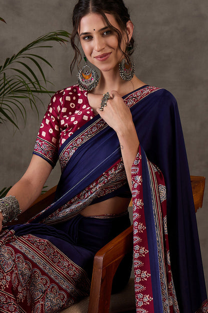 Exceptional Navy Blue Ajrakh Printed Semi Modal Silk Saree With Flameboyant Blouse Piece