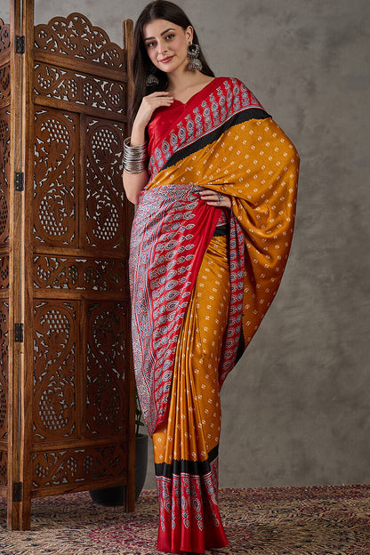 Exquisite Yellow Ajrakh Printed Semi Modal Silk Saree With Evocative Blouse Piece