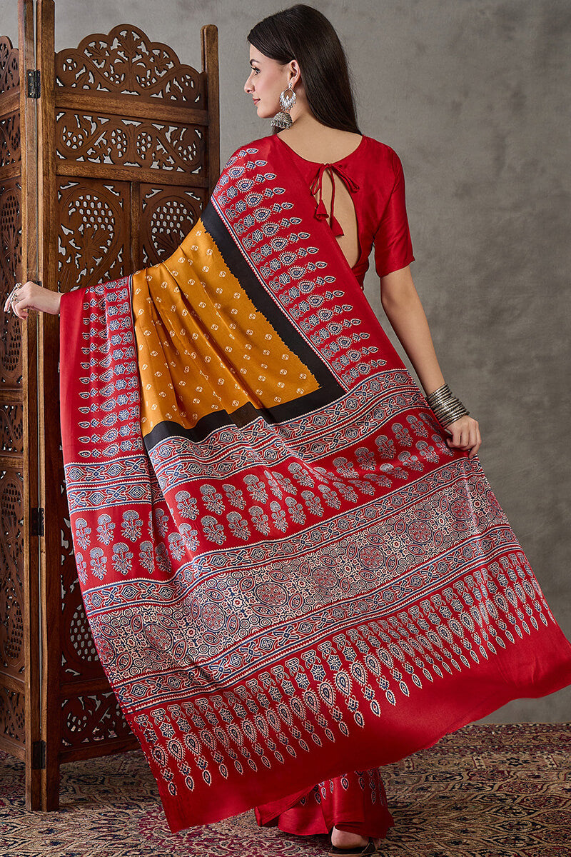 Exquisite Yellow Ajrakh Printed Semi Modal Silk Saree With Evocative Blouse Piece