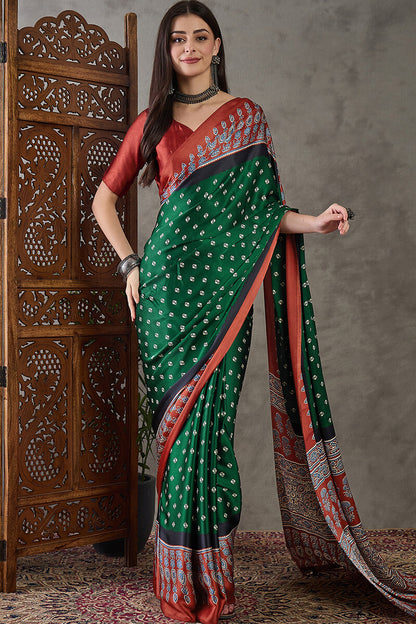 Deserving Dark Green Ajrakh Printed Semi Modal Silk Saree With Stunner Blouse Piece