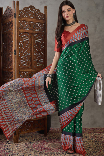 Deserving Dark Green Ajrakh Printed Semi Modal Silk Saree With Stunner Blouse Piece