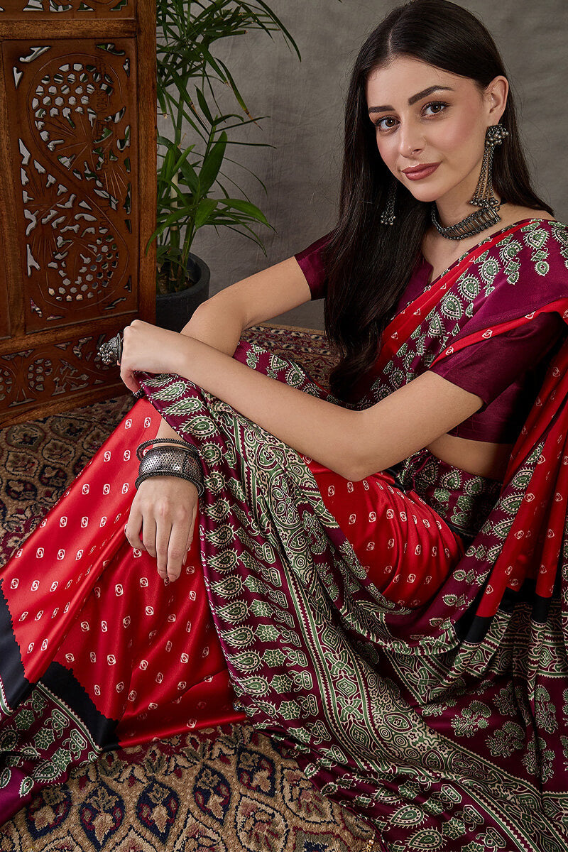 Eloquence Red Ajrakh Printed Semi Modal Silk Saree With Groovy Blouse Piece