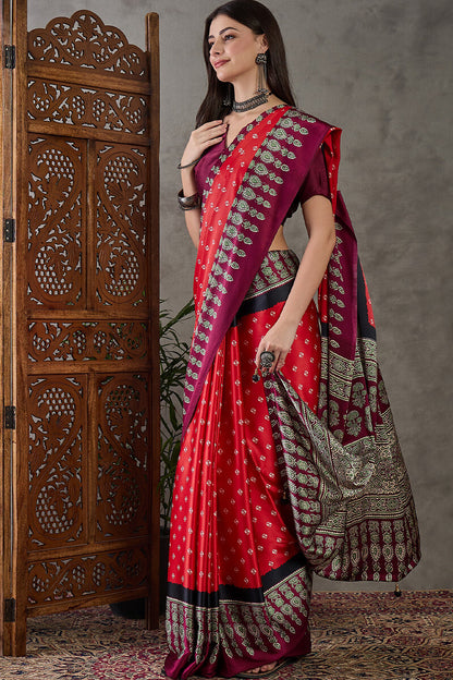 Eloquence Red Ajrakh Printed Semi Modal Silk Saree With Groovy Blouse Piece
