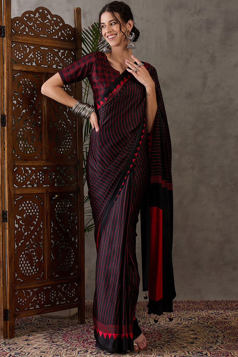 Diaphanous Black Ajrakh Printed Semi Modal Silk Saree With Majestic Blouse Piece