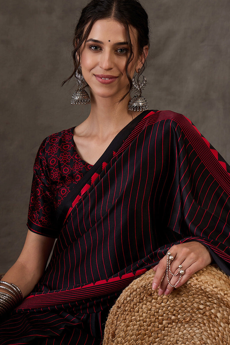 Diaphanous Black Ajrakh Printed Semi Modal Silk Saree With Majestic Blouse Piece