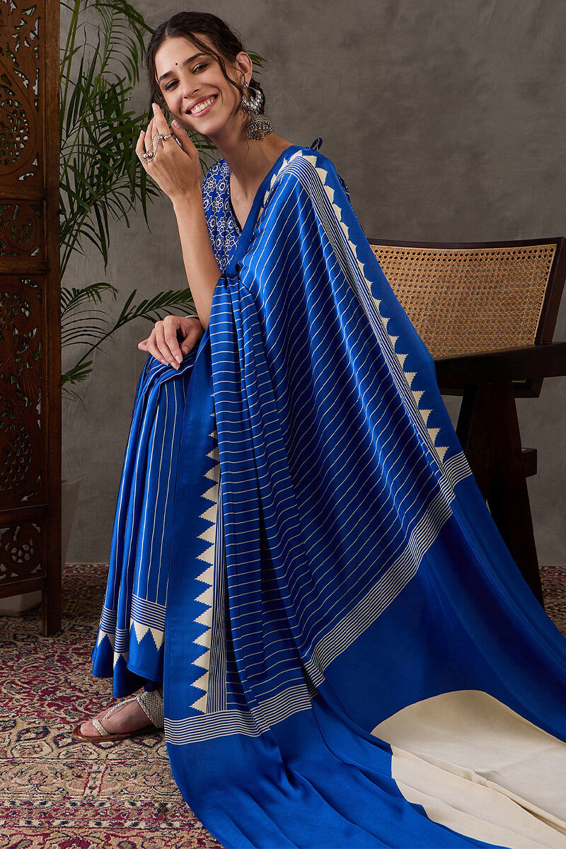 Most Flattering Blue Ajrakh Printed Semi Modal Silk Saree With Adorable Blouse Piece