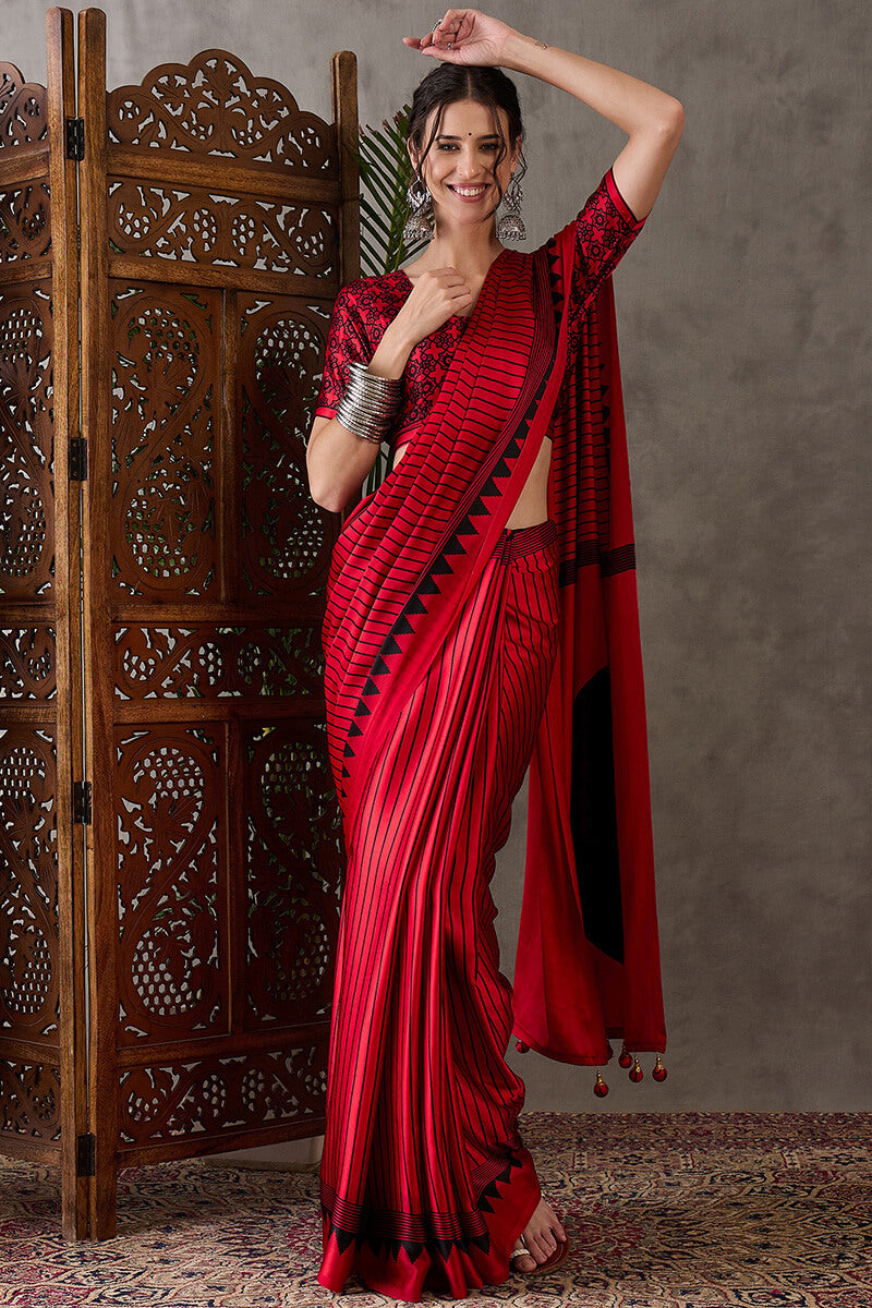 Ornate Red Ajrakh Printed Semi Modal Silk Saree With Alluring Blouse Piece