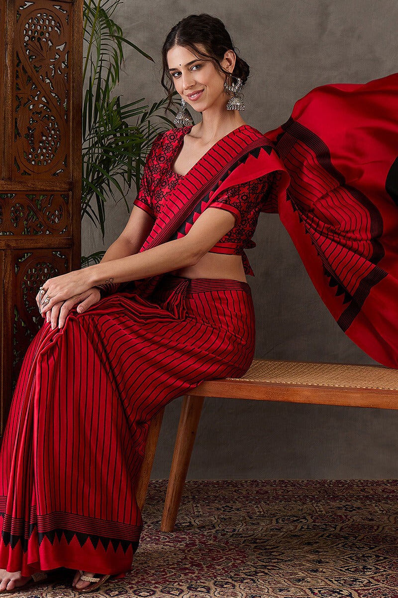 Ornate Red Ajrakh Printed Semi Modal Silk Saree With Alluring Blouse Piece