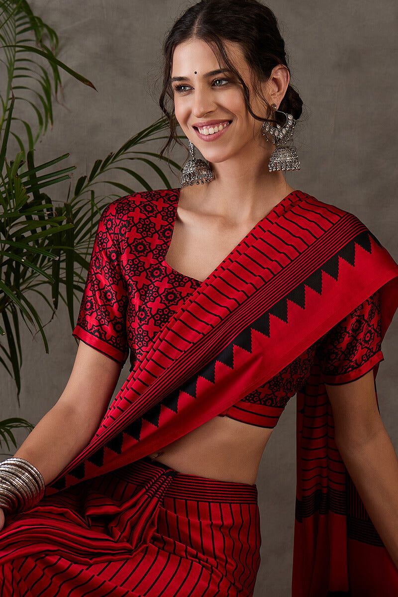 Ornate Red Ajrakh Printed Semi Modal Silk Saree With Alluring Blouse Piece
