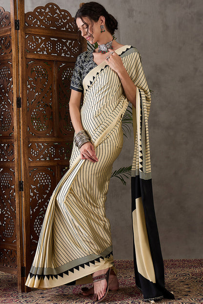 Alluring Beige Ajrakh Printed Semi Modal Silk Saree With Cynosure Blouse Piece