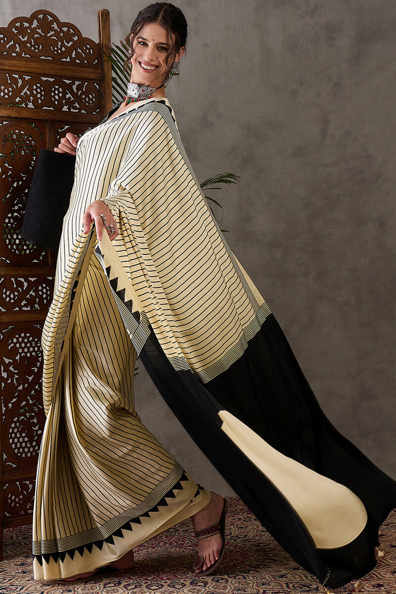 Alluring Beige Ajrakh Printed Semi Modal Silk Saree With Cynosure Blouse Piece