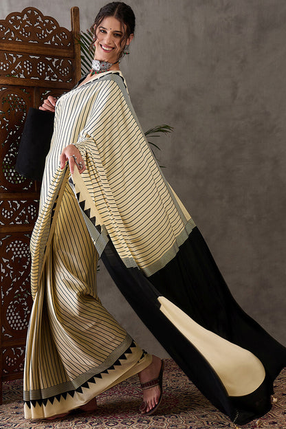 Alluring Beige Ajrakh Printed Semi Modal Silk Saree With Cynosure Blouse Piece