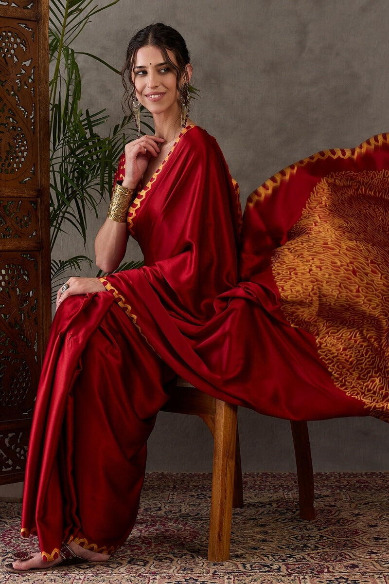 Panache Red Ajrakh Printed Semi Modal Silk Saree With Chatoyant Blouse Piece