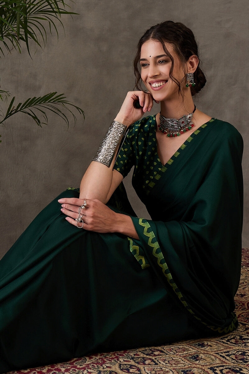 Majesty Dark Green Ajrakh Printed Semi Modal Silk Saree With Outstanding Blouse Piece