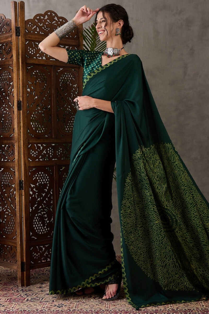 Majesty Dark Green Ajrakh Printed Semi Modal Silk Saree With Outstanding Blouse Piece
