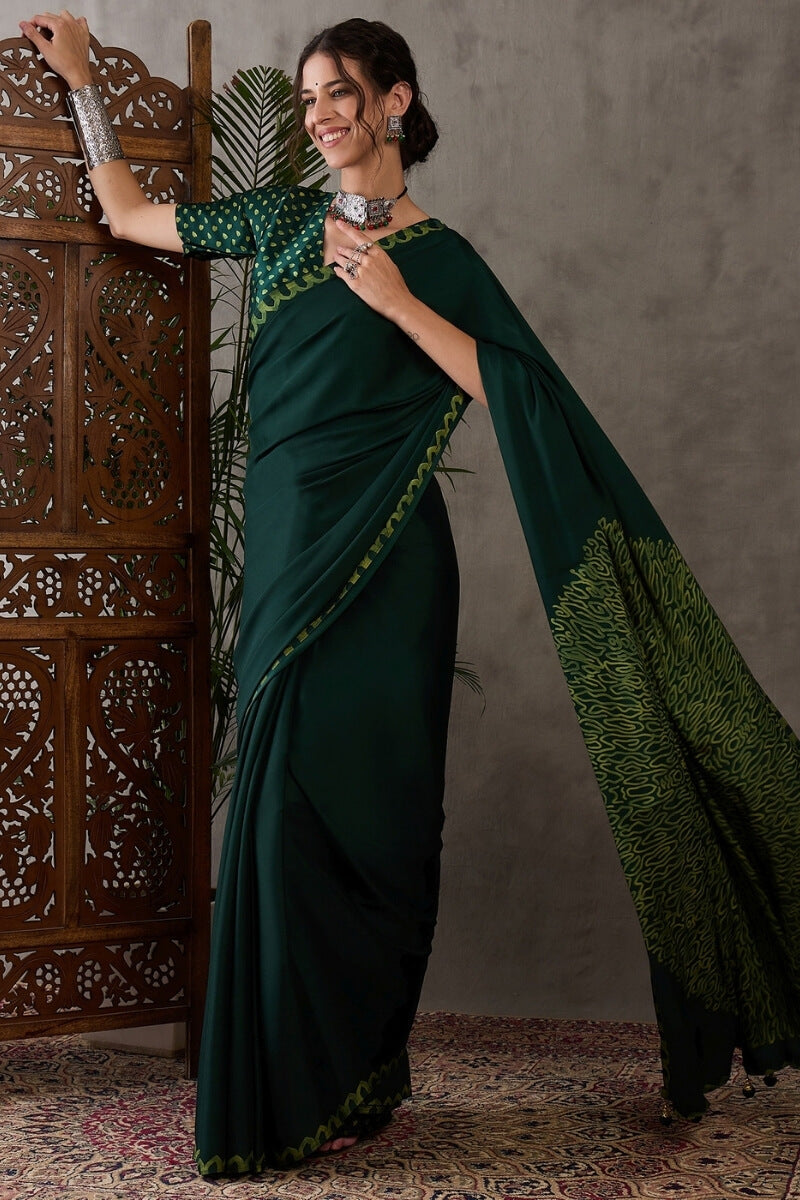 Majesty Dark Green Ajrakh Printed Semi Modal Silk Saree With Outstanding Blouse Piece
