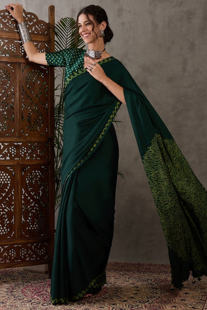 Majesty Dark Green Ajrakh Printed Semi Modal Silk Saree With Outstanding Blouse Piece