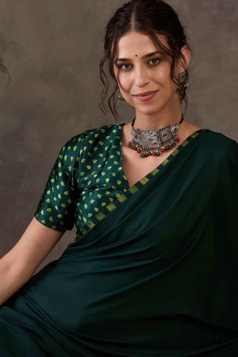 Majesty Dark Green Ajrakh Printed Semi Modal Silk Saree With Outstanding Blouse Piece