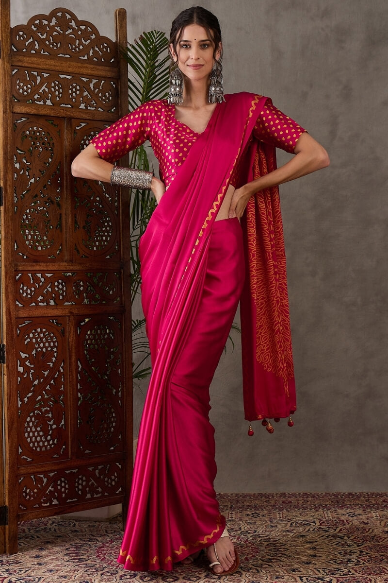 Appealing Dark Pink Ajrakh Printed Semi Modal Silk Saree With Elision Blouse Piece