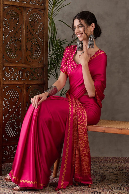 Appealing Dark Pink Ajrakh Printed Semi Modal Silk Saree With Elision Blouse Piece