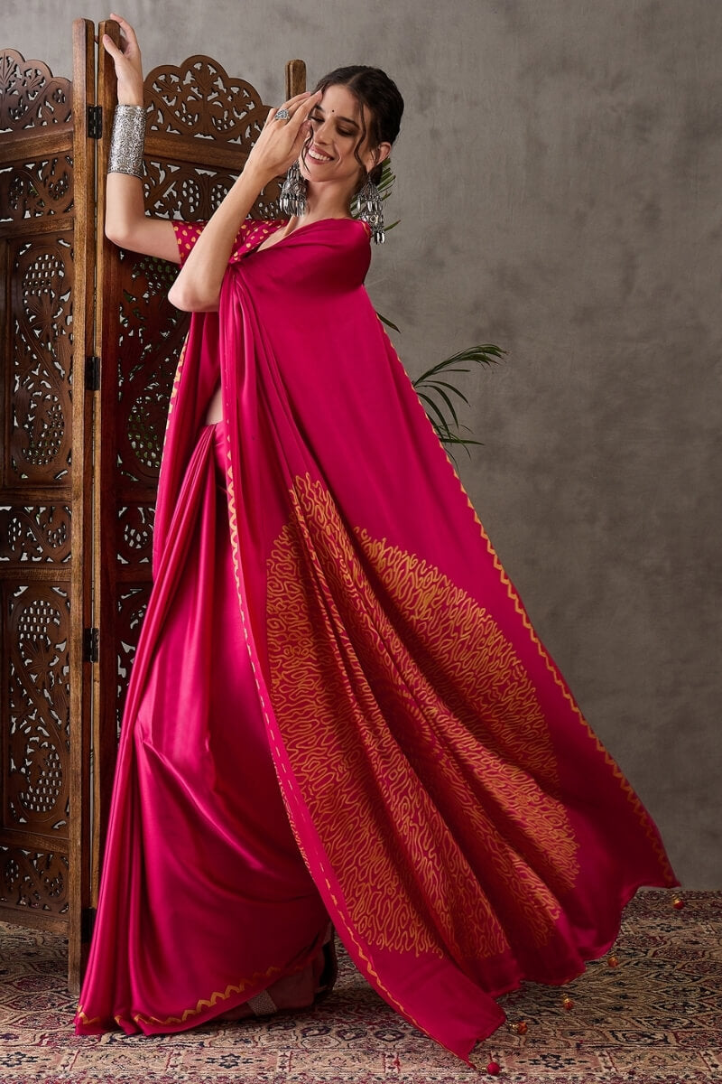 Appealing Dark Pink Ajrakh Printed Semi Modal Silk Saree With Elision Blouse Piece
