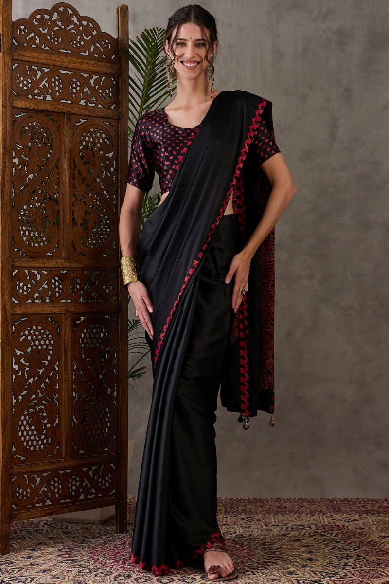 Super classy Black Ajrakh Printed Semi Modal Silk Saree With Symmetrical Blouse Piece