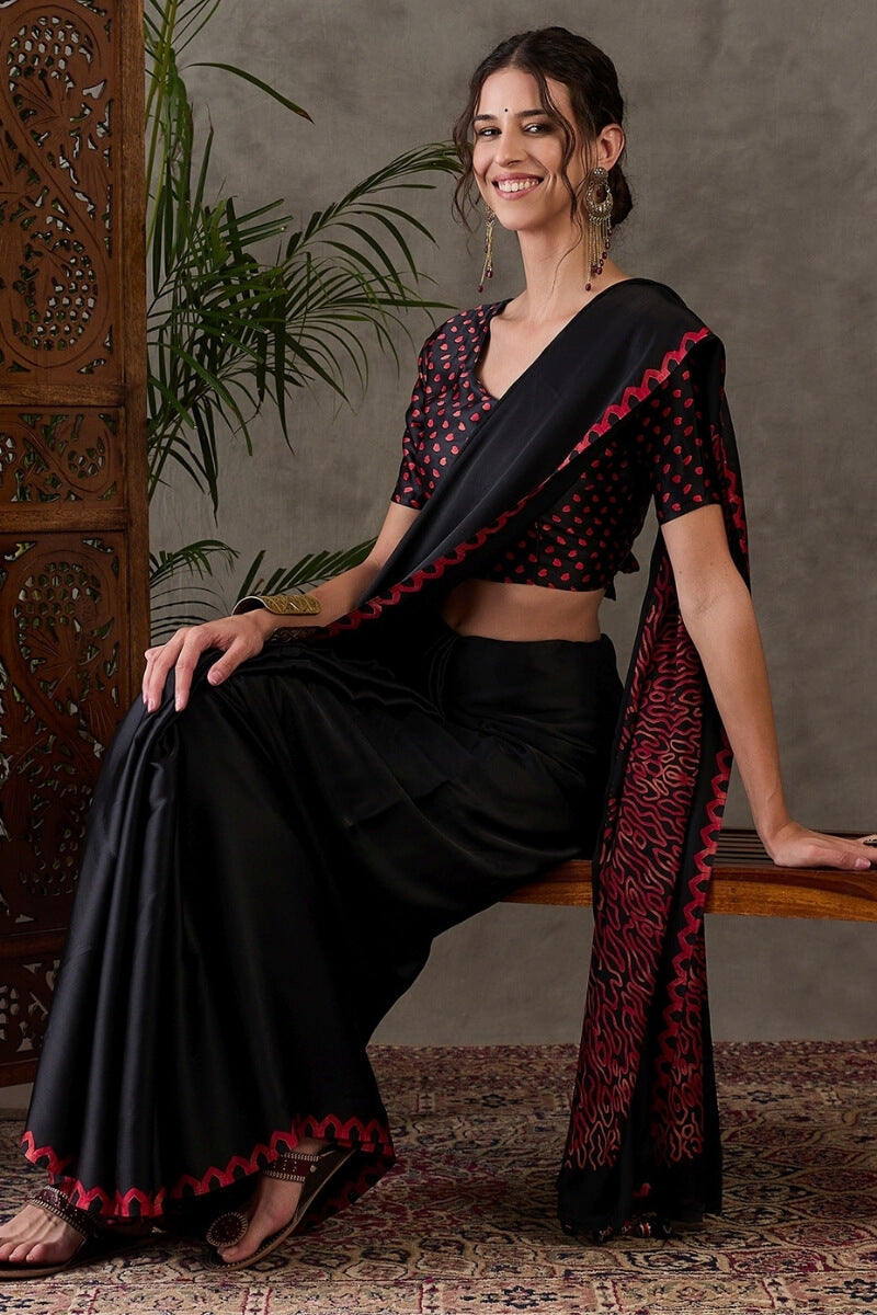 Super classy Black Ajrakh Printed Semi Modal Silk Saree With Symmetrical Blouse Piece
