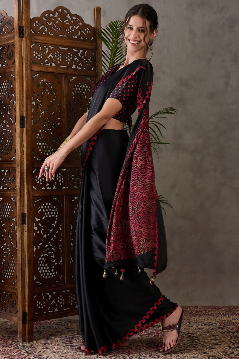Super classy Black Ajrakh Printed Semi Modal Silk Saree With Symmetrical Blouse Piece