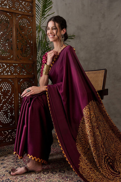 Beleaguer Wine Ajrakh Printed Semi Modal Silk Saree With Skinny Blouse Piece