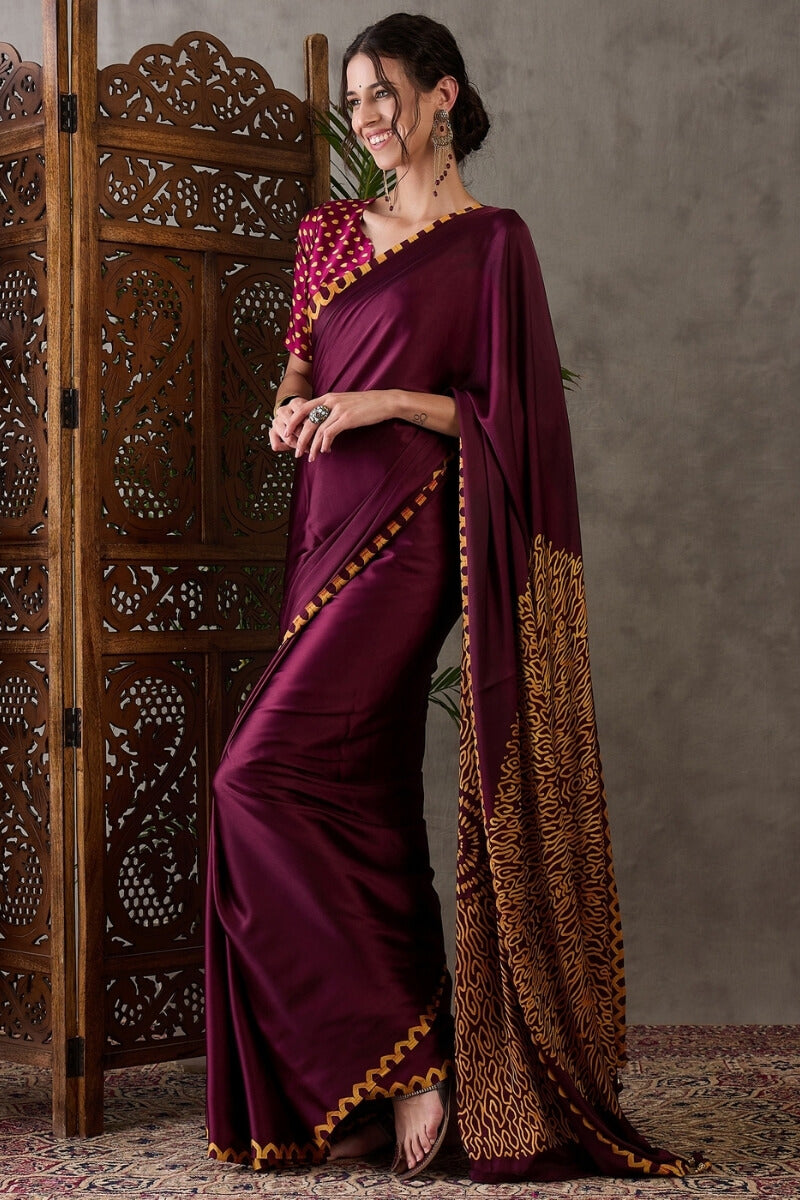Beleaguer Wine Ajrakh Printed Semi Modal Silk Saree With Skinny Blouse Piece