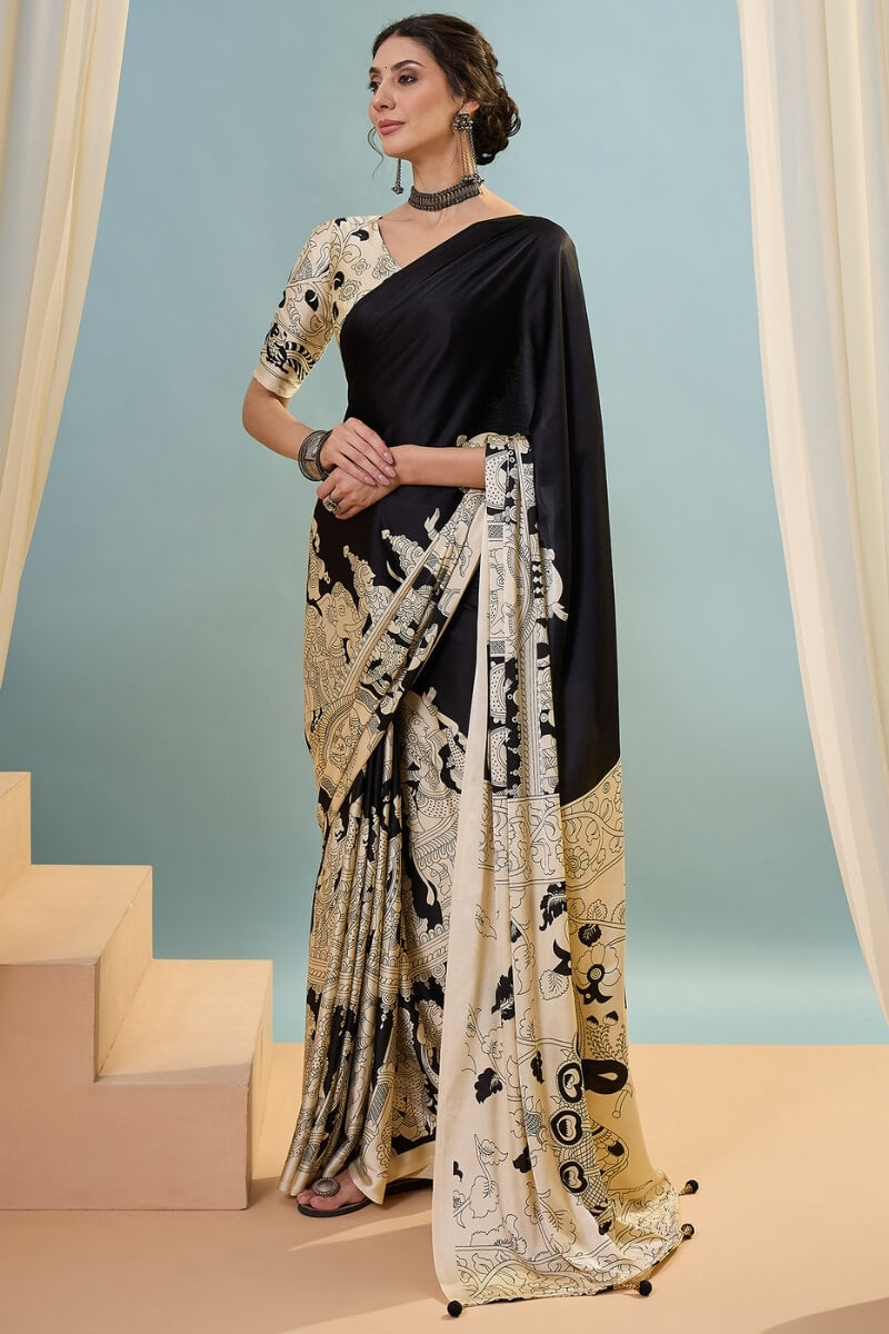 Mesmerising Black Ajrakh Printed Semi Modal Silk Saree With Unequalled Blouse Piece