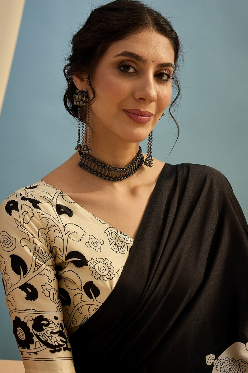 Mesmerising Black Ajrakh Printed Semi Modal Silk Saree With Unequalled Blouse Piece