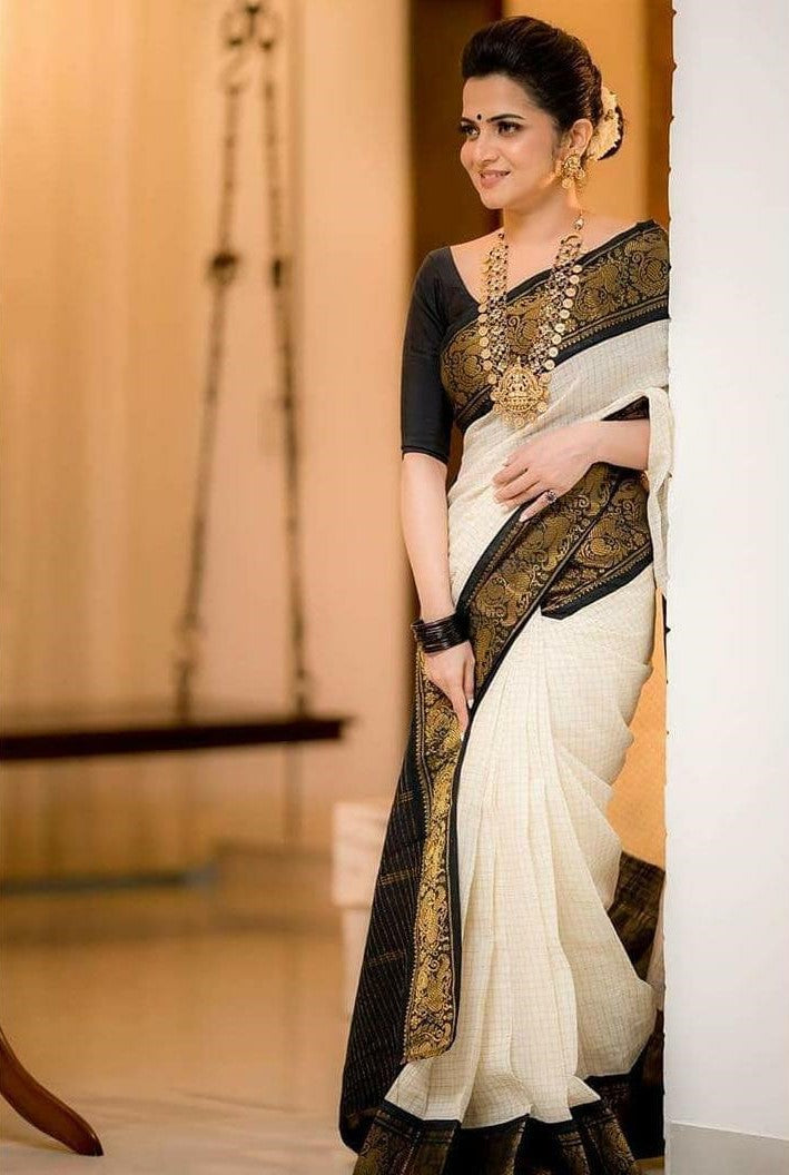Moiety Off White Soft Banarasi Silk Saree With Panoply Blouse Piece