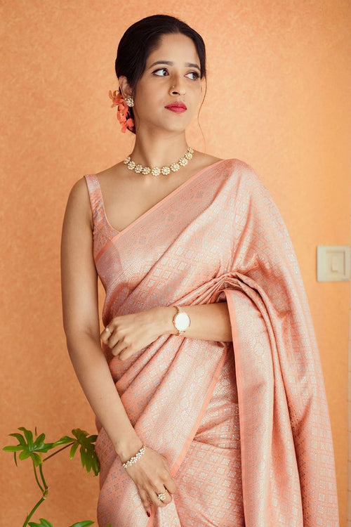 Load image into Gallery viewer, Gleaming Peach Soft Banarasi Silk Saree With Energetic Blouse Piece
