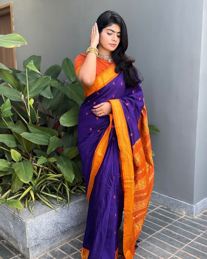 Gleaming Purple Soft Silk Saree With Phenomenal Blouse Piece