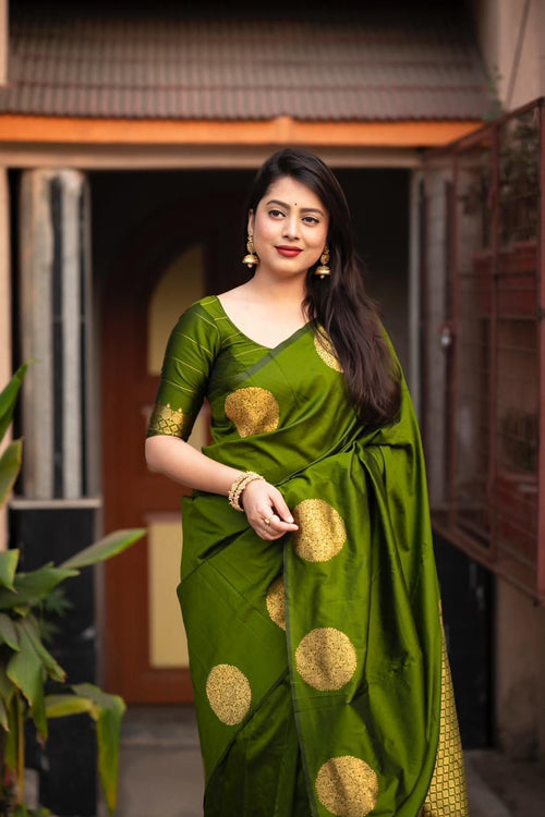 Load image into Gallery viewer, Gorgeous Green Soft Silk Saree With Sophisticated Blouse Piece
