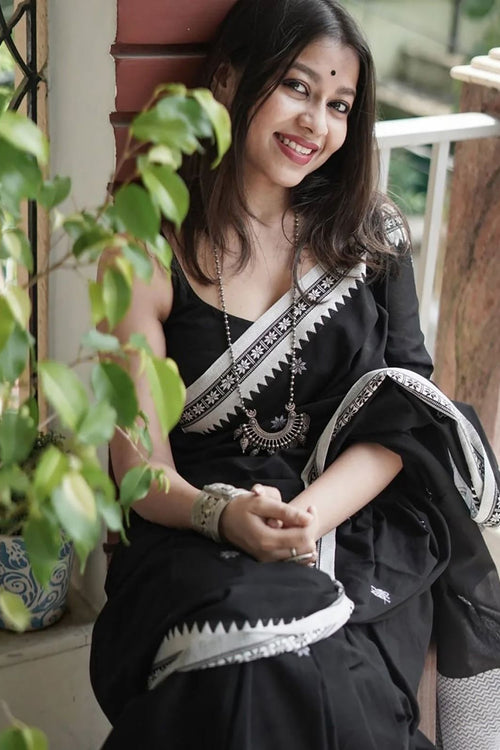 Load image into Gallery viewer, Twirling Black Cotton Silk Saree With Opulent Blouse Piece
