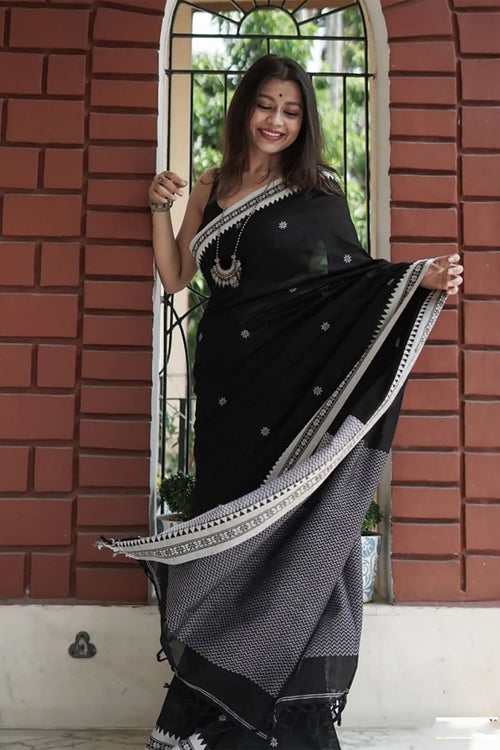 Load image into Gallery viewer, Twirling Black Cotton Silk Saree With Opulent Blouse Piece
