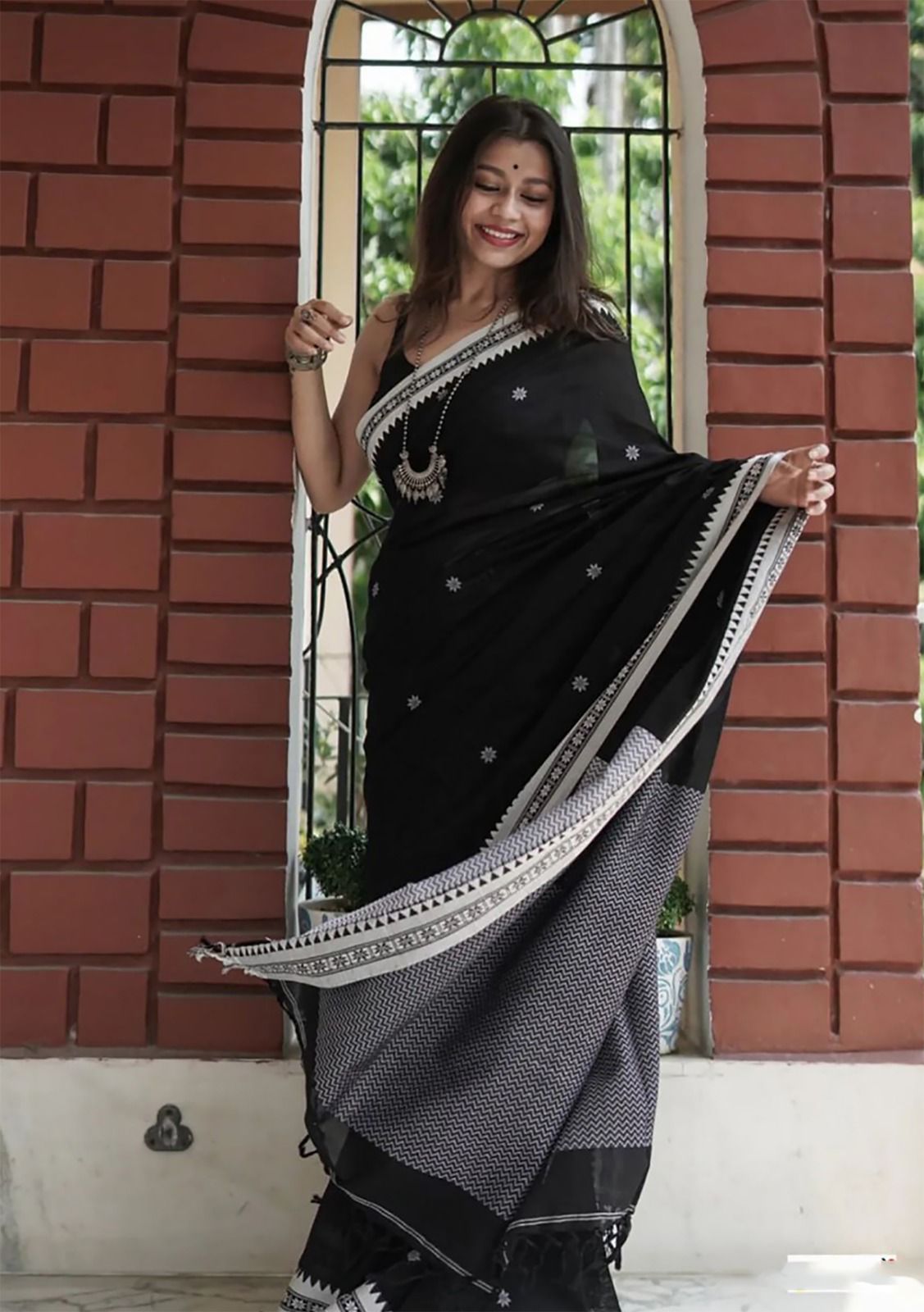 Twirling Black Cotton Silk Saree With Opulent Blouse Piece