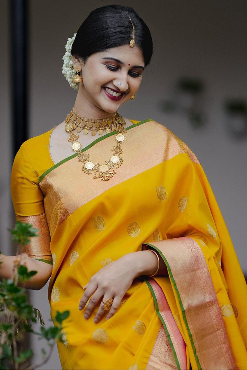 Amazing Yellow Soft Silk Saree With Surpassing Blouse Piece