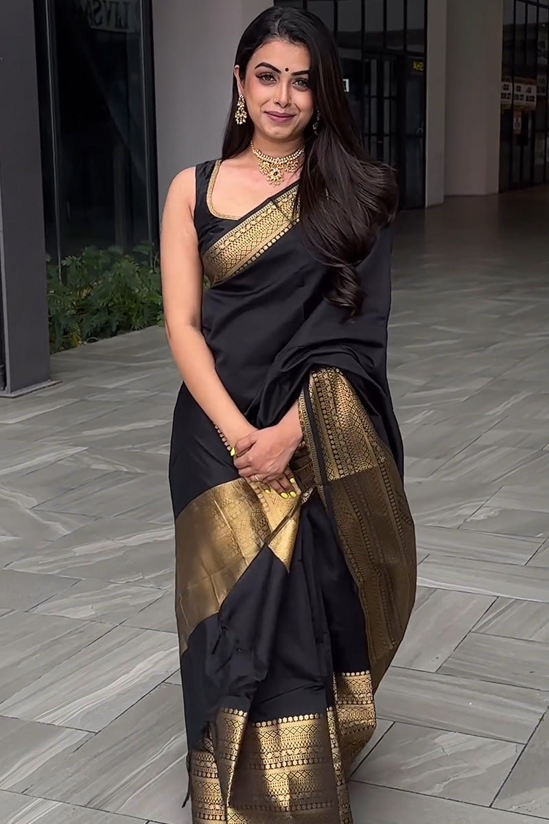 Appealing Black Soft Silk Saree With Prominent Blouse Piece